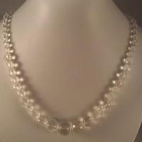 Collier cristal de roche facette perles progressives