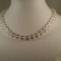 Collier cristal de roche perles intercalaires dorees