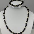 Parure obsidienne doree 1